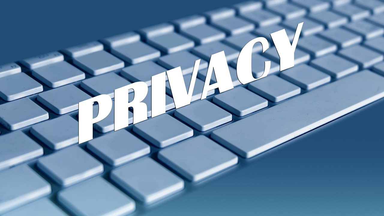 Privacy text displayed over a computer keyboard